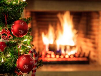 Christmas tree and burning fireplace